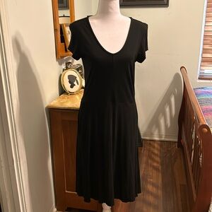 Peruvian Connection used, v-neck, black 100% cotton dress w/ pockets. Size M.